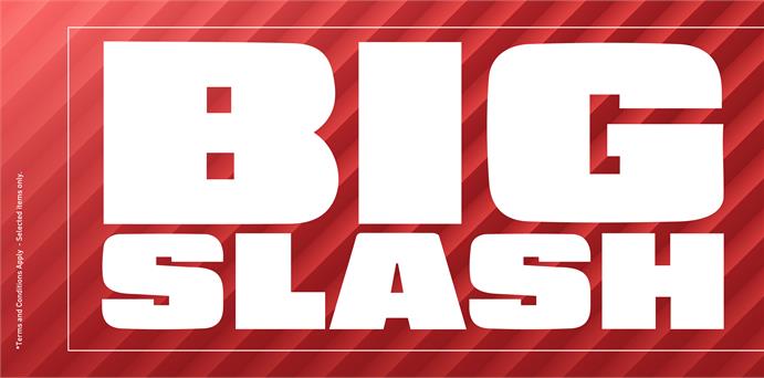 Promotional banner for K.M. Trading featuring the "BIG SLASH" sale text in large white font over a red diagonal striped background.